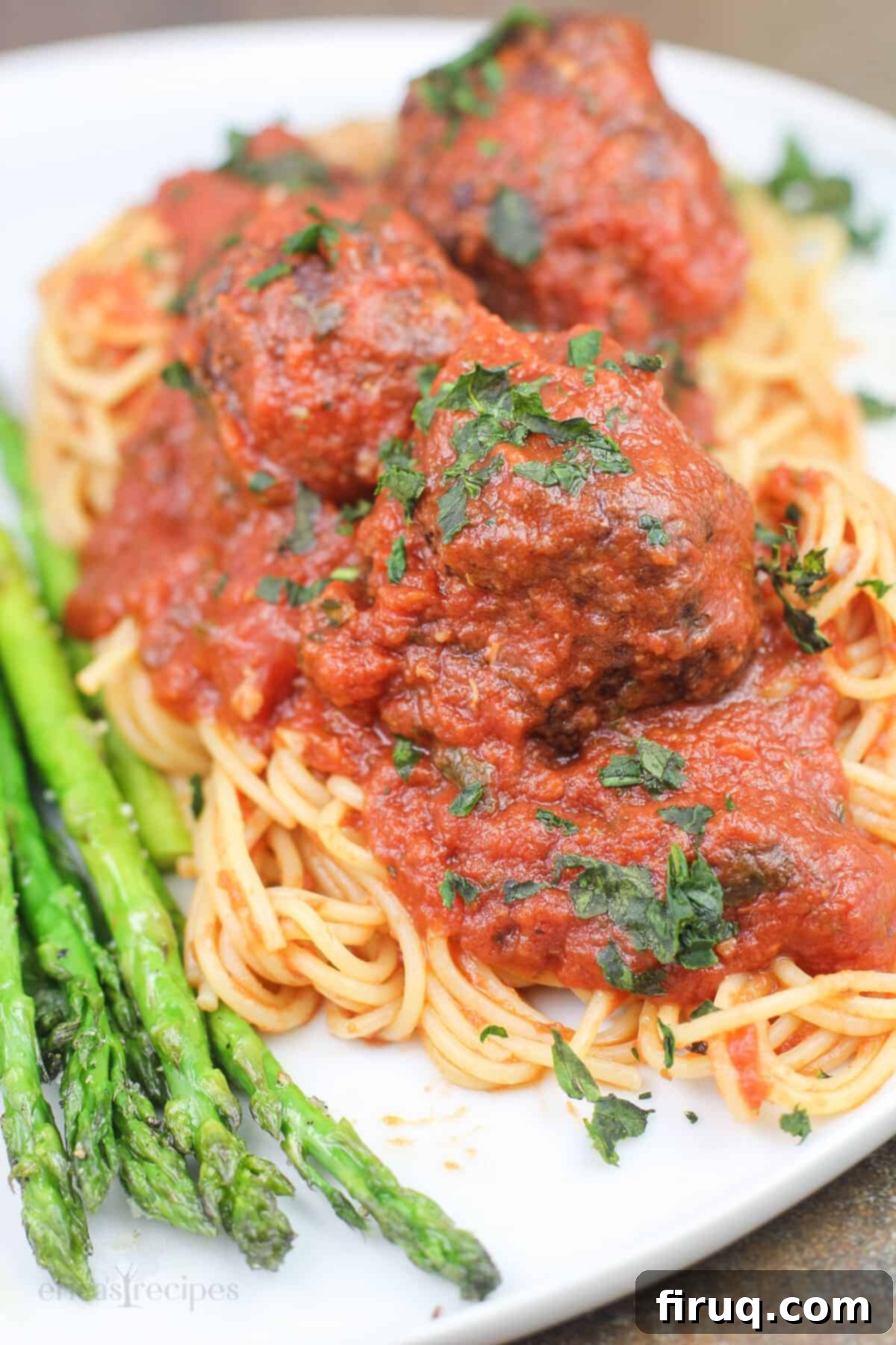 Smoky Meatballs in Tangy Marinara 12 prepared recipe on spaghetti with asparagus