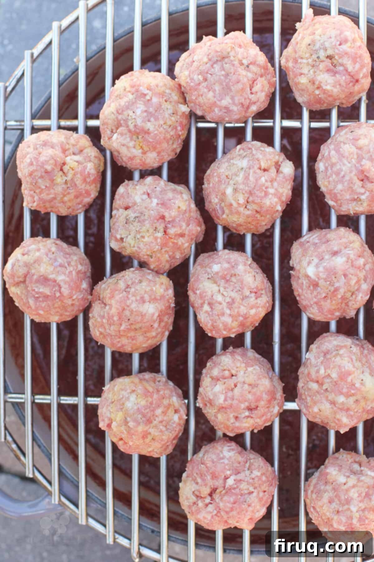 Smoky Meatballs in Tangy Marinara 5 uncooked meatballs on grill rack