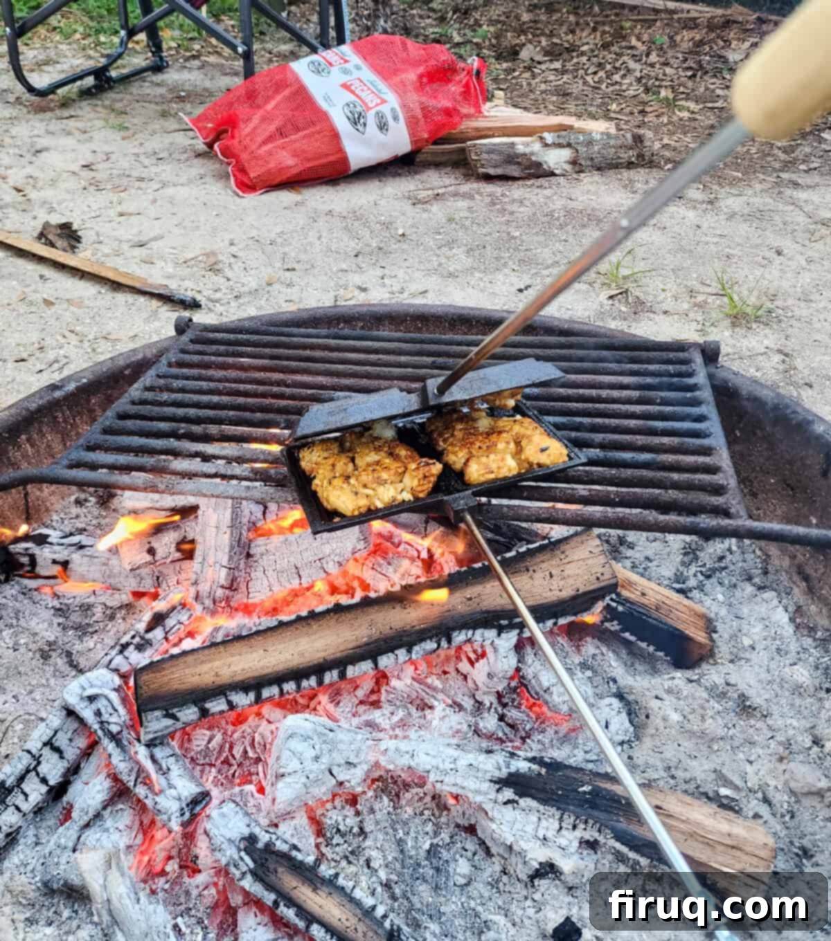Golden Pie Iron Potato Pockets 4 pie iron over hot coals in a campfire