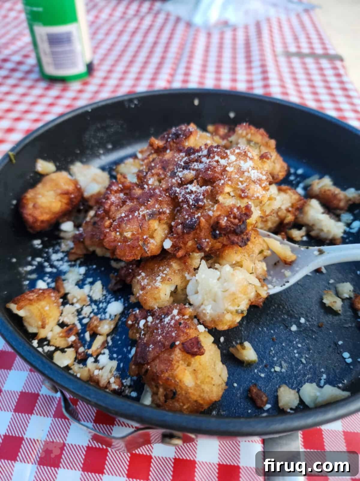Golden Pie Iron Potato Pockets 6 prepared taters on dish with spoon
