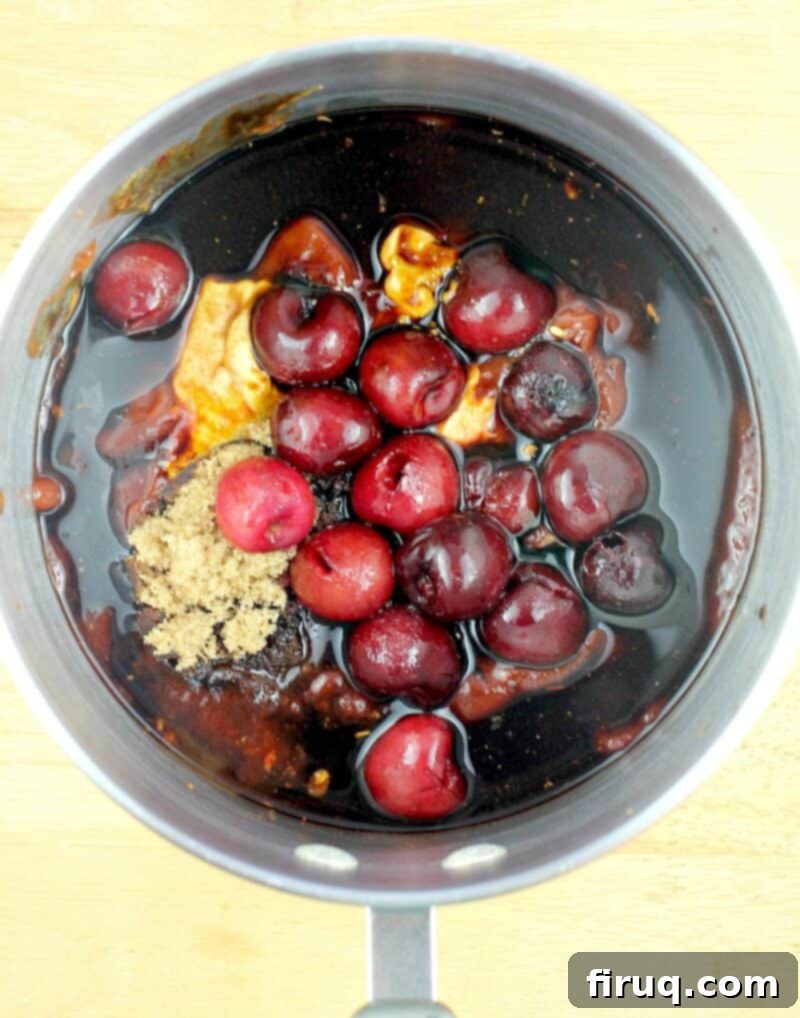 Sweet Heat Cherry Chipotle BBQ 6 ingredients added to a saucepan