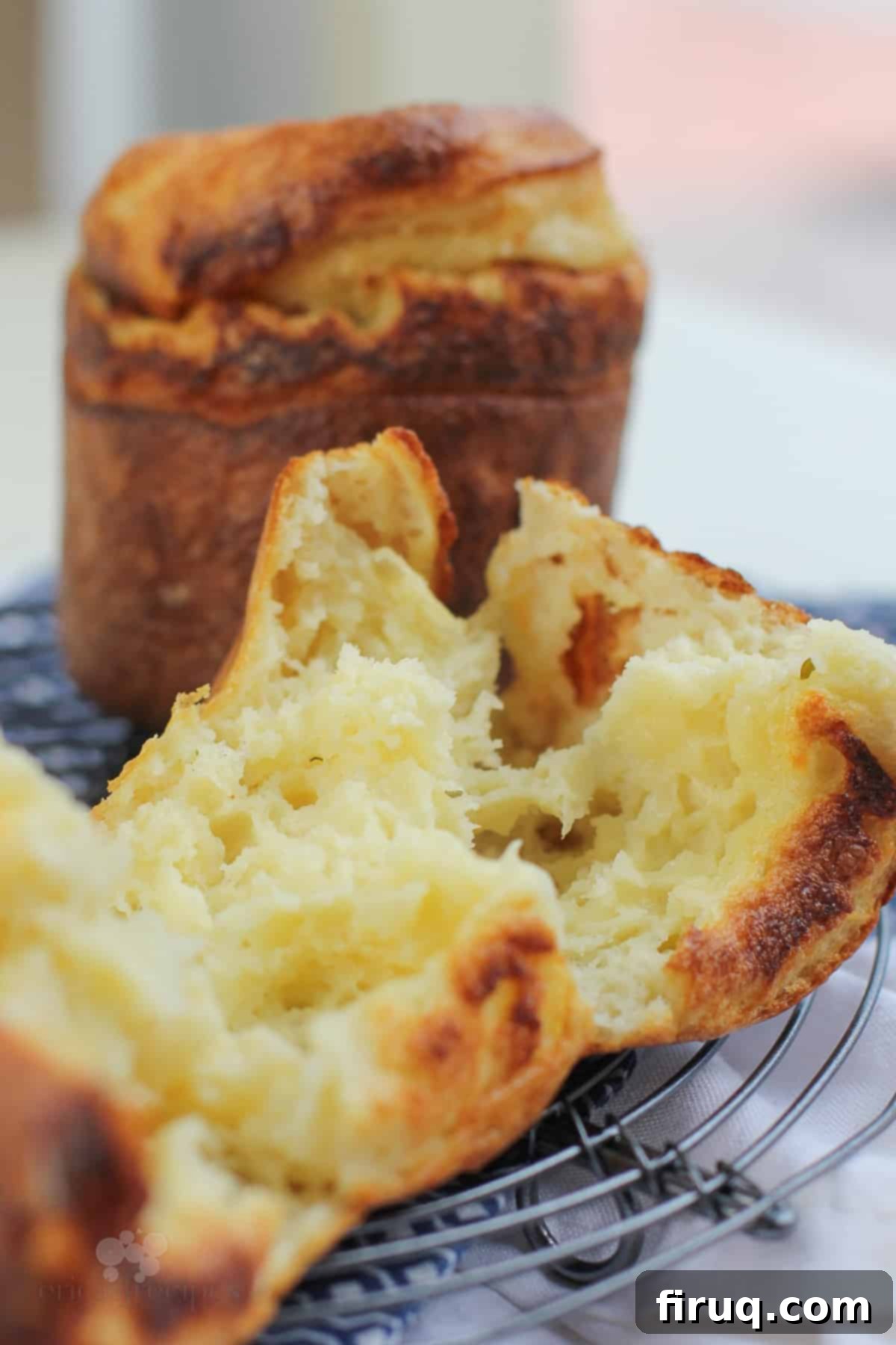Garlic Parmesan Puffs 3 fluffy inside of a popover
